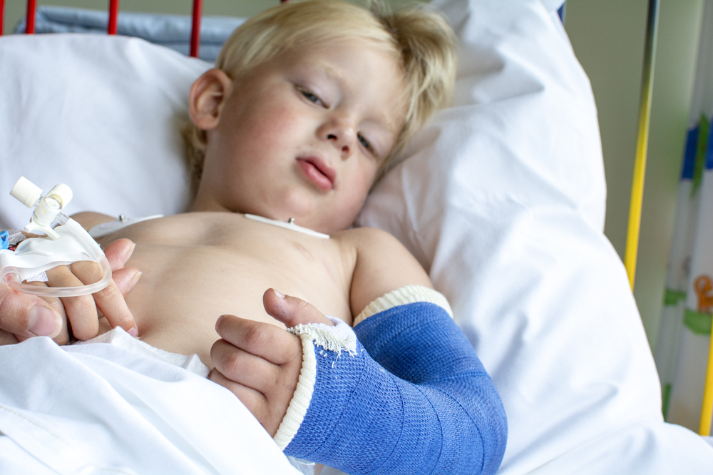 Kid with arm in cast