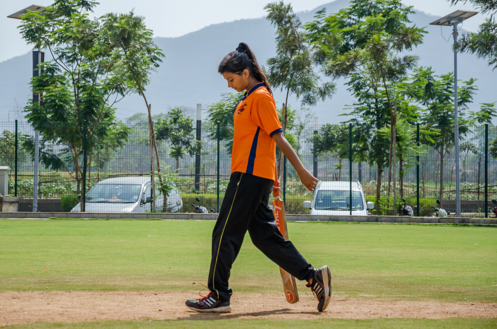 Indian Girl With Cricket Bat