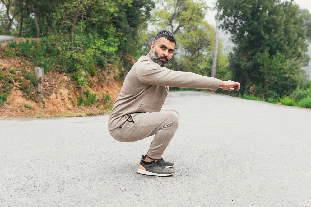Indian Man Squating