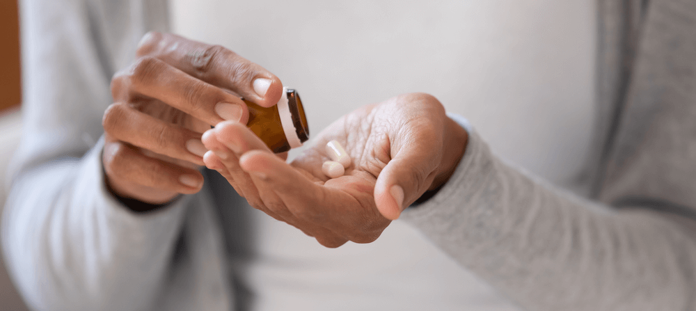 Person drinking pills