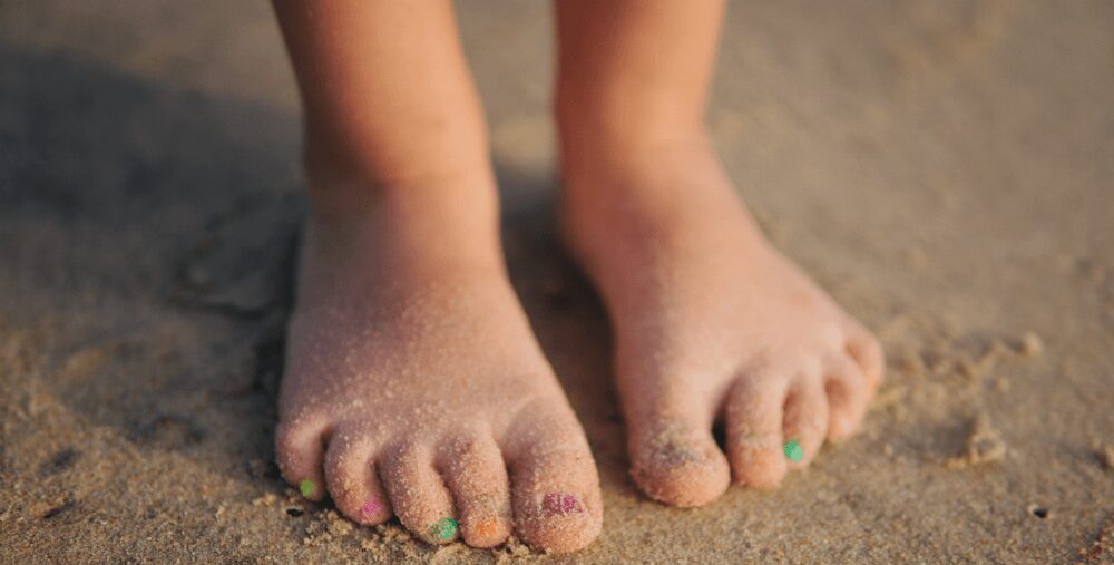 Bare feet in sand